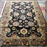 R33. Hand tufted wool rug. Made in India. 5' x 8' 